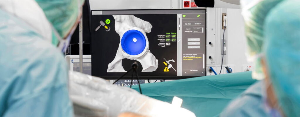 Surgeons performing an operation with the help of robotic technology